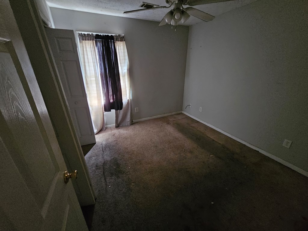 65 Ryan Loop Phenix City, AL 36869 - Photo 10 of 18 a view of a hallway with a window