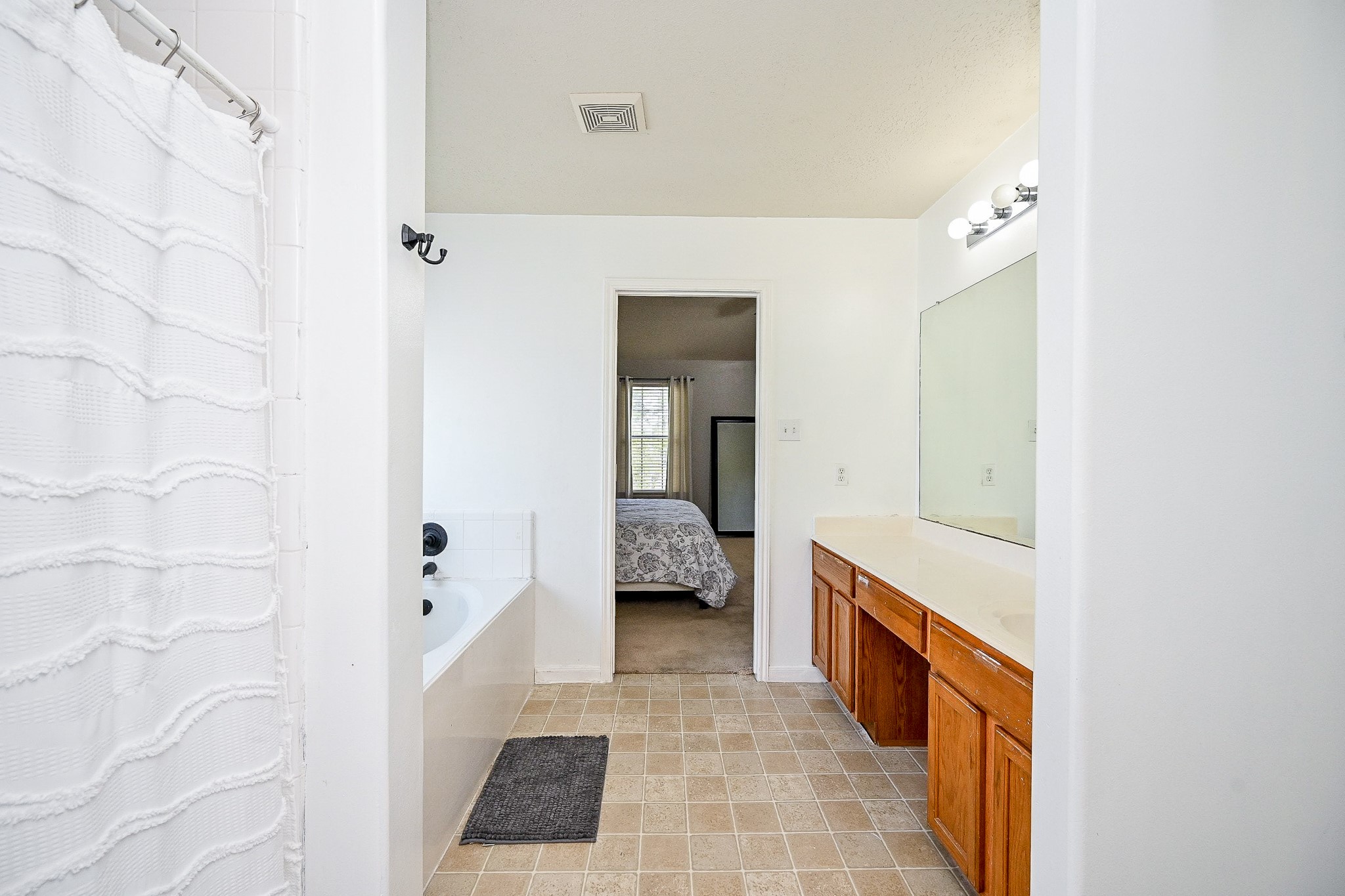 2534 Halstead Drive Spring, TX 77386 - Photo 29 of 35 a hallway with sliding door and bedroom