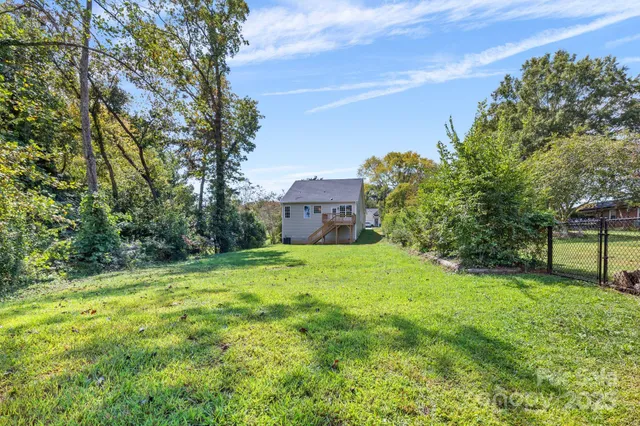 a view of a backyard with a garden