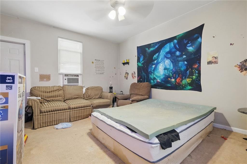 853 Railroad Street McKees Rocks, PA 15136 - Photo 11 of 19 a living room with furniture and a painting on the wall