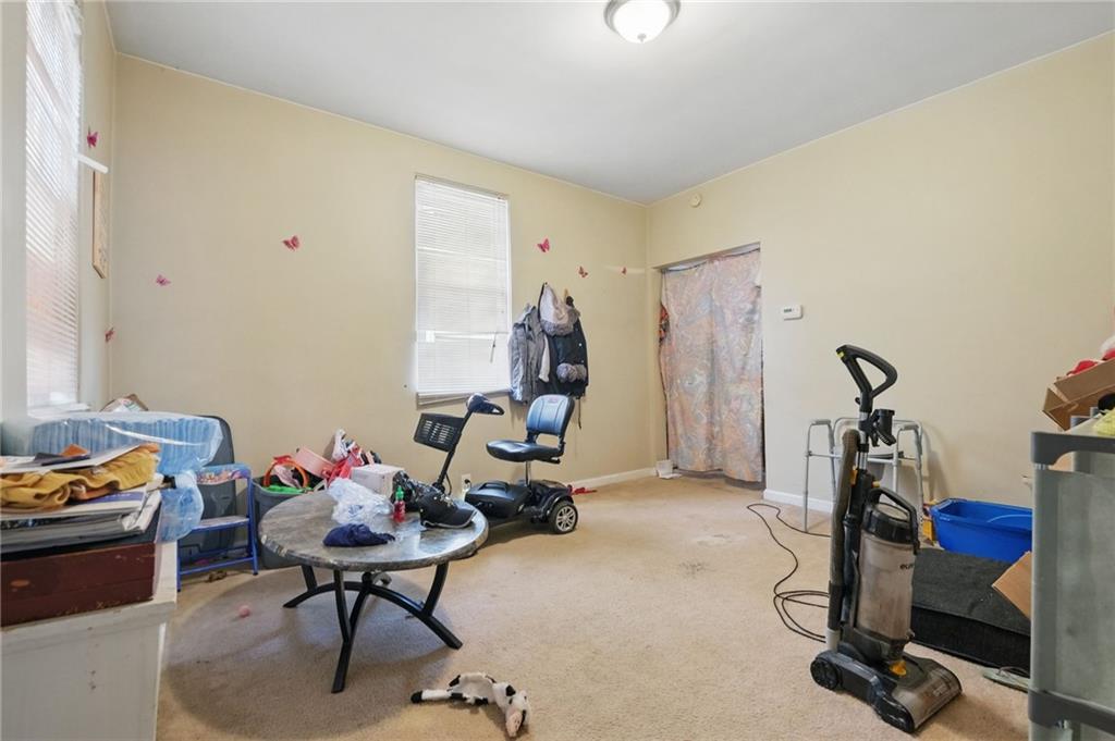 853 Railroad Street McKees Rocks, PA 15136 - Photo 13 of 19 a view of a room with gym equipment