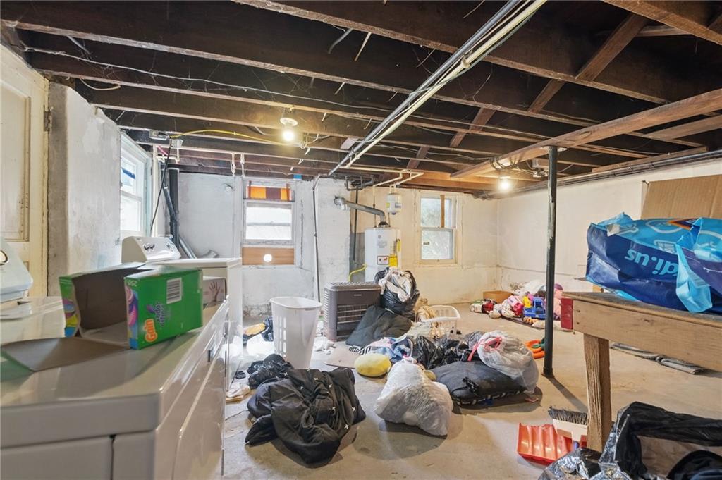 853 Railroad Street McKees Rocks, PA 15136 - Photo 14 of 19 a gym room with furniture and a chandelier