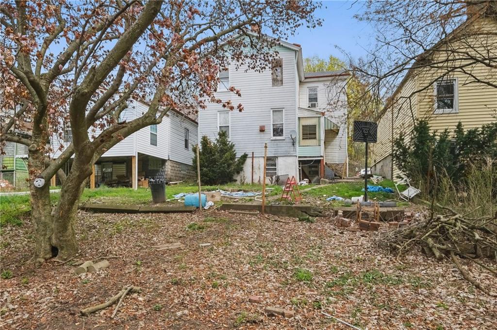 853 Railroad Street McKees Rocks, PA 15136 - Photo 17 of 19 a view of a house with a yard