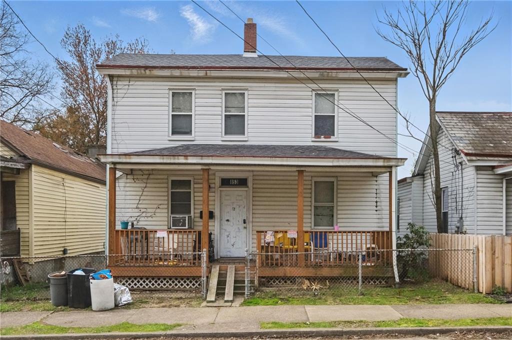 853 Railroad Street McKees Rocks, PA 15136 - Photo 3 of 19 a front view of a house with garden