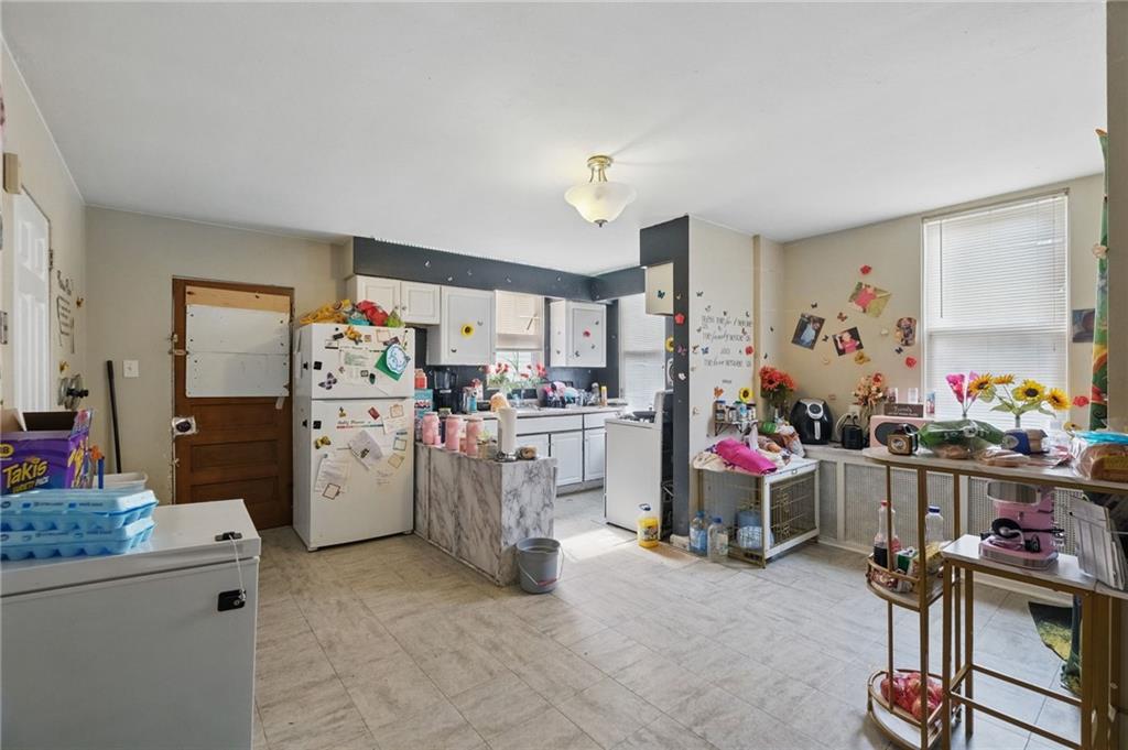 853 Railroad Street McKees Rocks, PA 15136 - Photo 5 of 19 a room with storage and utility