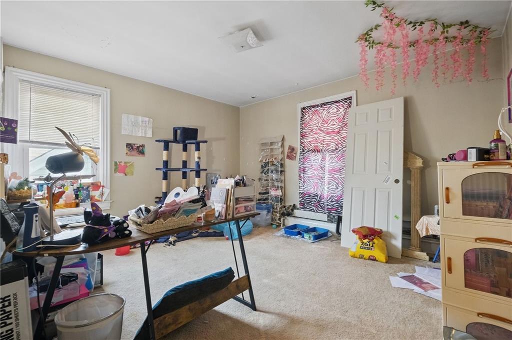 853 Railroad Street McKees Rocks, PA 15136 - Photo 6 of 19 a room with furniture toys and a window