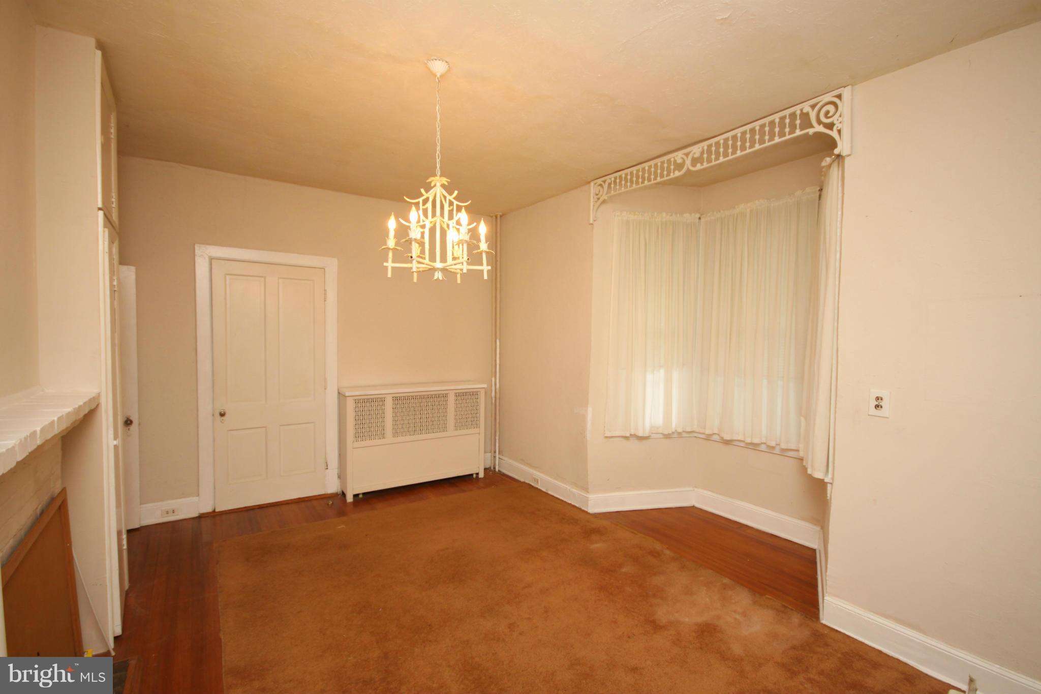 1610 South Rolling Road Baltimore, MD 21227 - Photo 13 of 19 a view of an empty room with a window