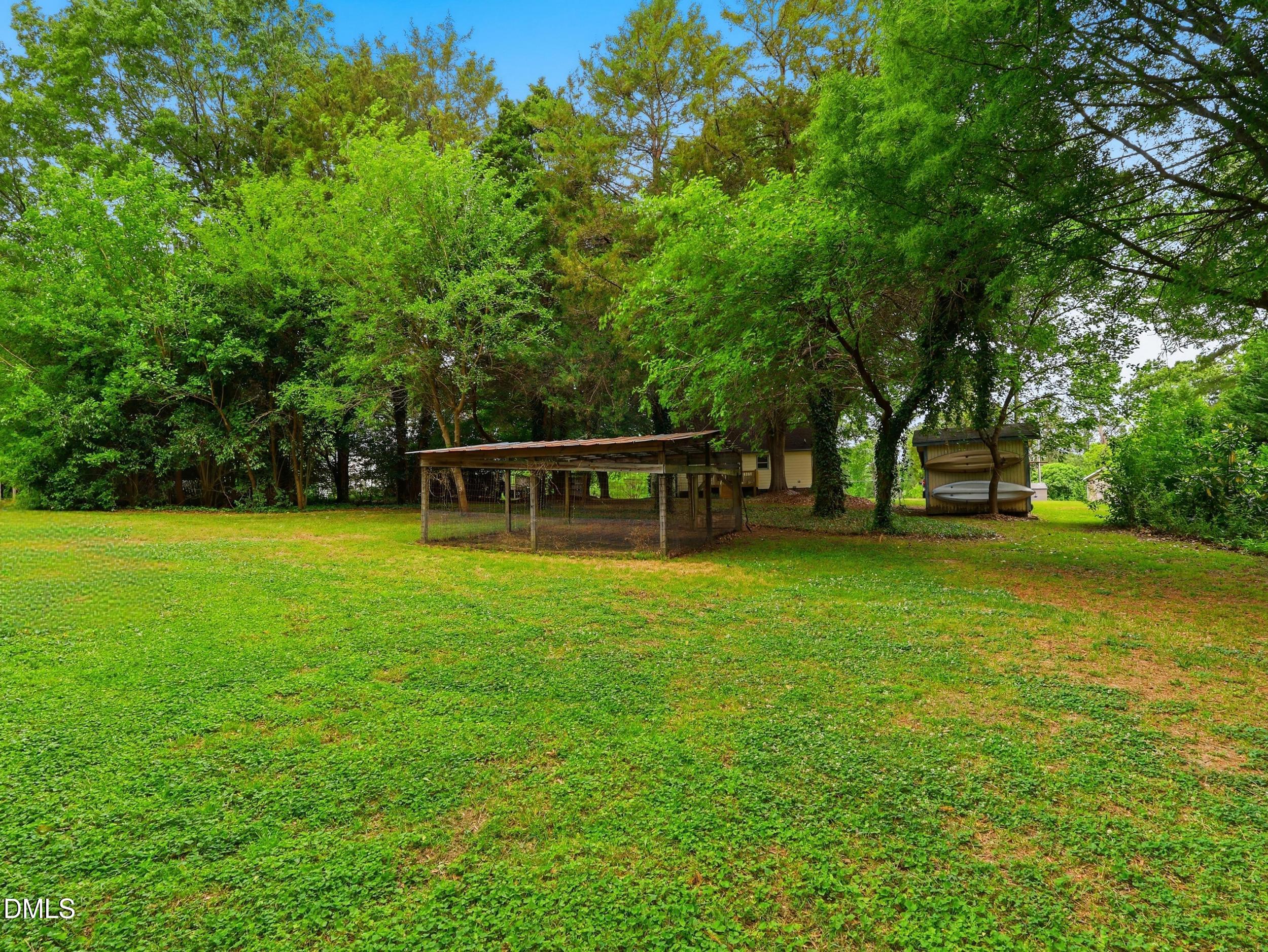 517 Lake Glad Road Wendell, NC 27591 - Photo 29 of 36 a view of a house with a backyard
