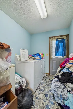 a bedroom with a bed and cabinets