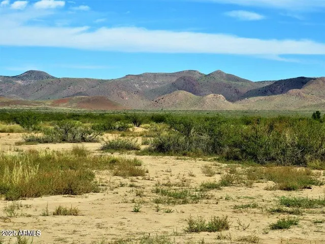 a view of lake with mountain