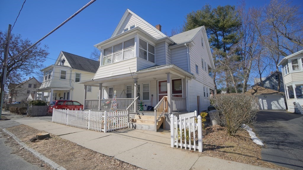 24-26 Wait Street Springfield, MA 01104 - Photo 2 of 15 a view of a white building with large windows