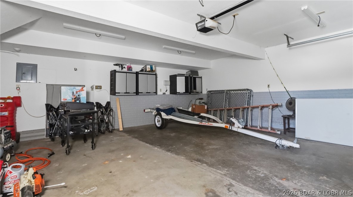 1069 Indian Hill Road Sunrise Beach, MO 65079 - Photo 33 of 54 Oversized 2-Car Garage