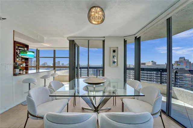 a view of a glass door with a floor to ceiling window