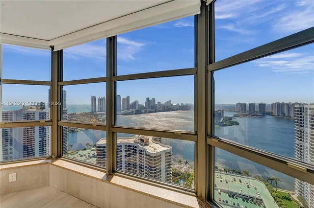 a view of a city with tall buildings