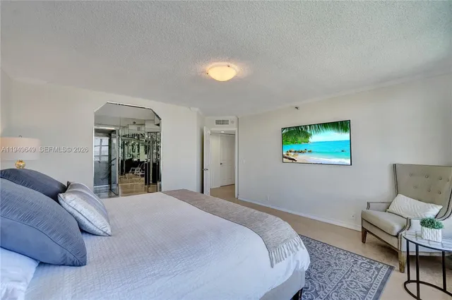 a view of a livingroom with furniture and a fireplace