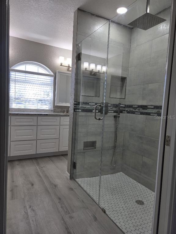 Undisclosed Address Spring Hill, FL 34609 - Photo 21 of 50 a bathroom with a shower