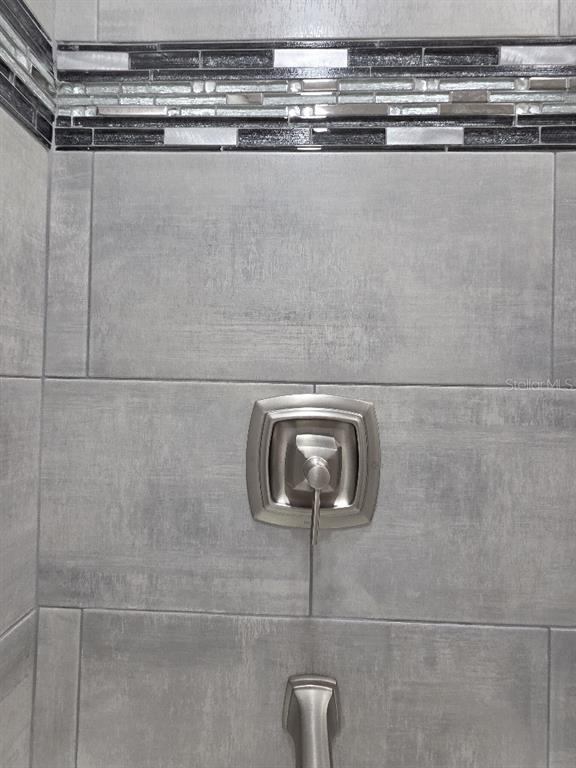 Undisclosed Address Spring Hill, FL 34609 - Photo 31 of 50 a close view of a mirror in a bathroom