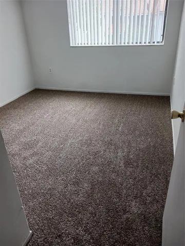 a view of a room with a window