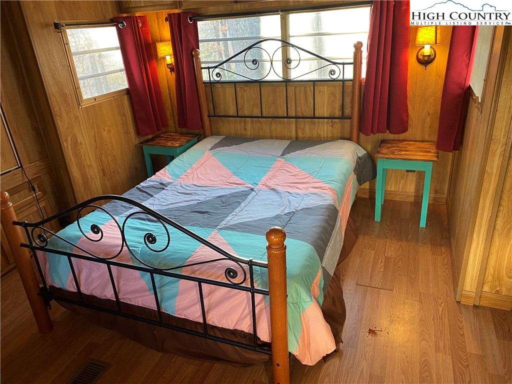 252 Jameson Road Newland, NC 28657 - Photo 12 of 16 a bedroom with a bed and a window