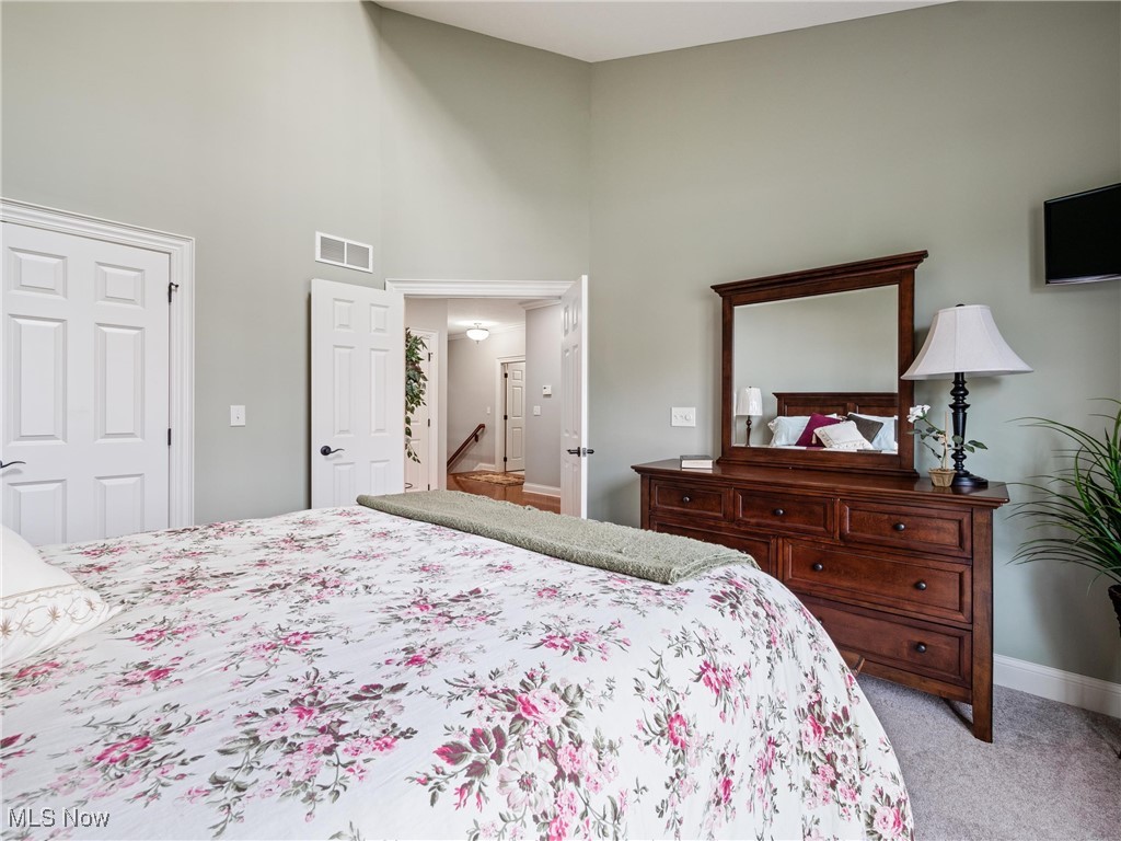 5349 Slater Ridge Westerville, OH 43082 - Photo 4 of 50 Carpeted bedroom with a high ceiling and baseboards