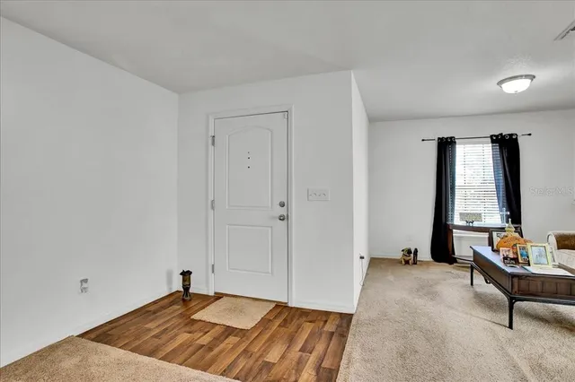 a living room with furniture and a couch