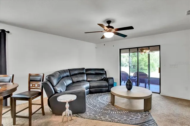 a view of an outdoor dining space with furniture