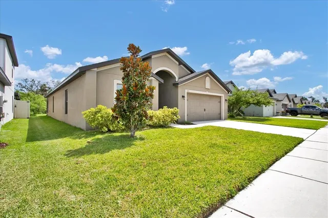 a bathroom with a sink and shower