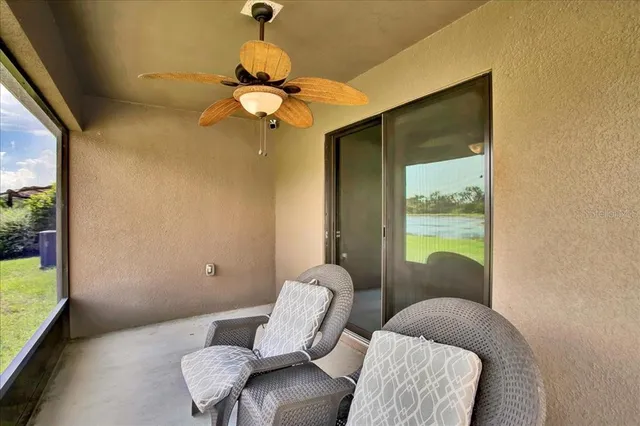 a bedroom with a bed and a lamp on table
