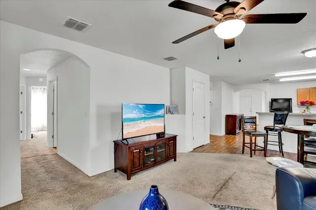 a bedroom with a bed and cabinet