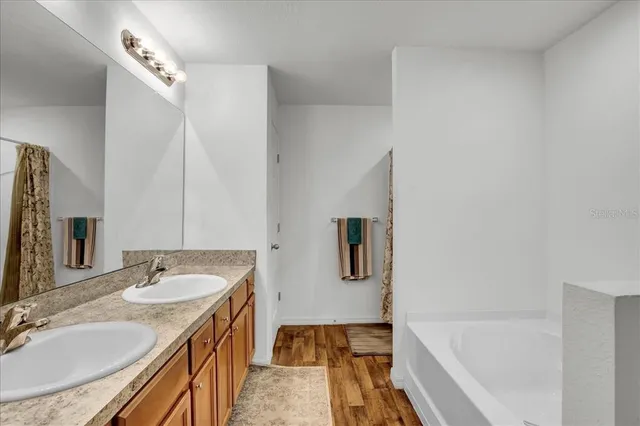 a view of storage and utility room with washer and dryer