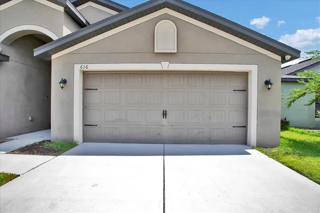a front view of a house with a hallway