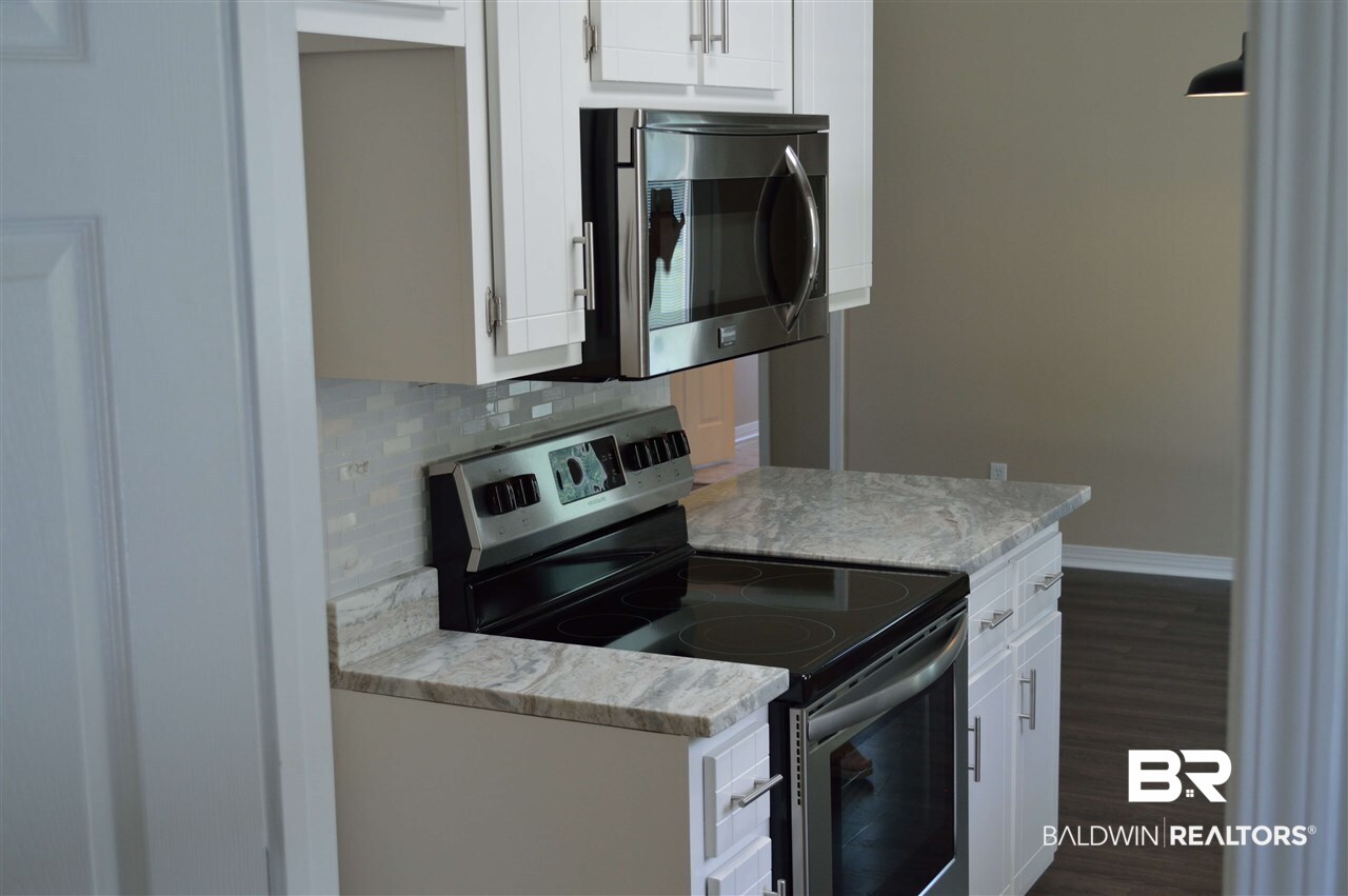 4954 Look Rook Road Orange Beach, AL 36561 - Photo 4 of 32 Brand new stainless appliances