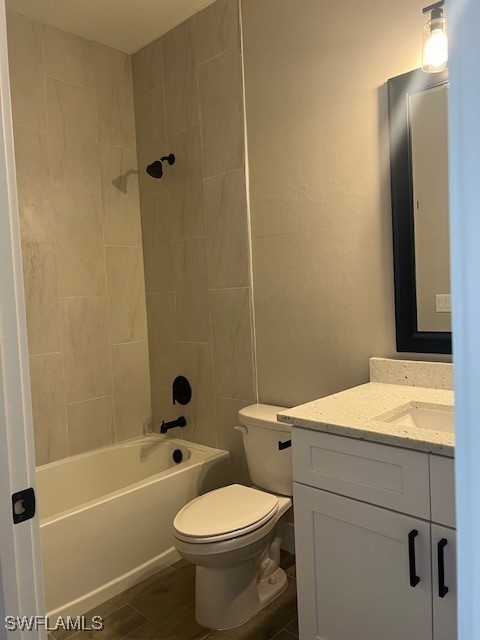 712 Dade Street, Unit 2 Immokalee, FL 34142 - Photo 3 of 5 a bathroom with a sink toilet and shower