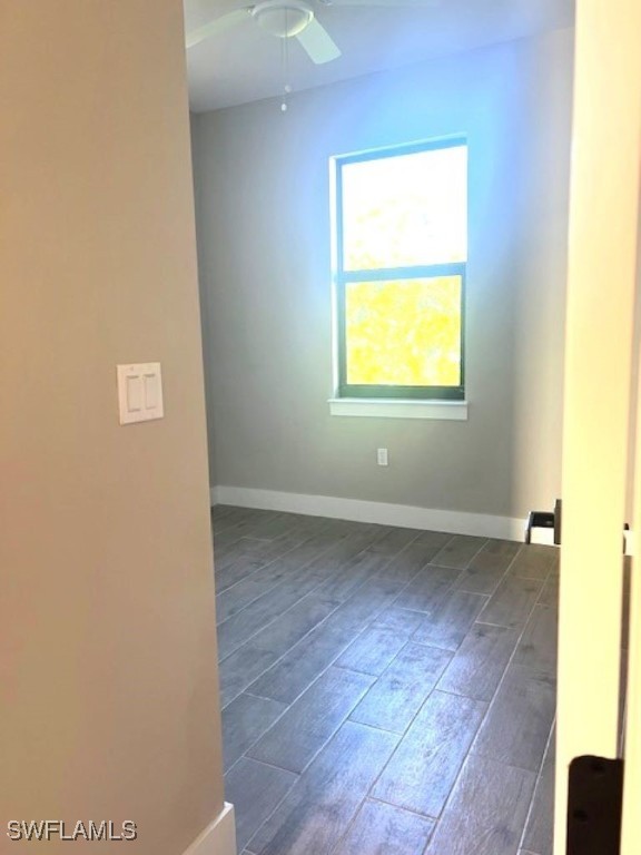 712 Dade Street, Unit 2 Immokalee, FL 34142 - Photo 4 of 5 a view of an empty room with a window