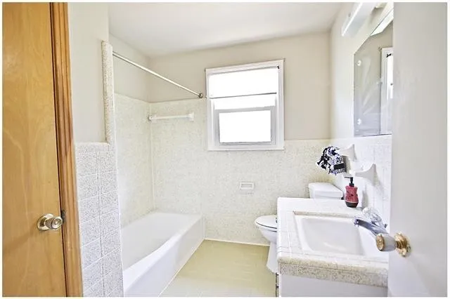 a bathroom with a sink and a bathtub