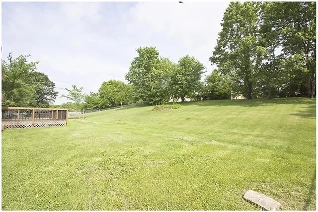 a view of a field with an outdoor space