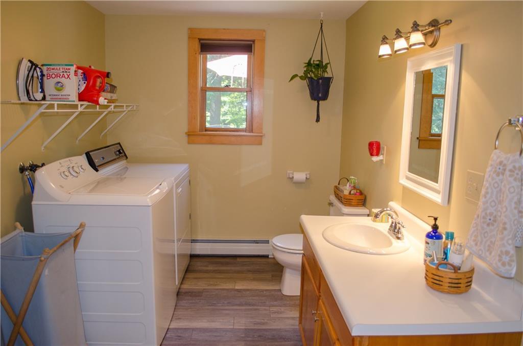 384 Plymouth Road Etna, ME 04434 - Photo 11 of 29 Large half bath with laundry on...