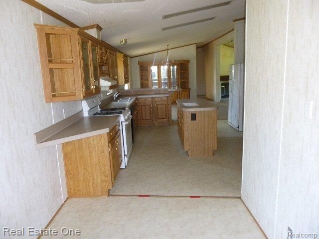 9343 West Sober Road Fowlerville, MI 48836 - Photo 10 of 41 Open Kitchen Dining area