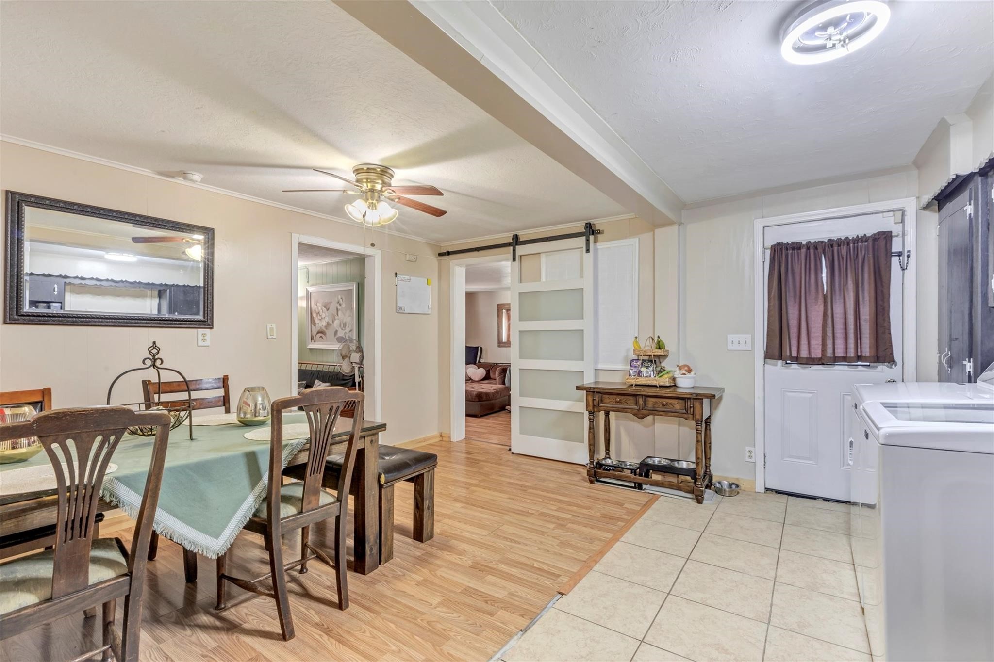 808 Morrell Street Baytown, TX 77520 - Photo 13 of 25 a view of a dining room with furniture and chandelier
