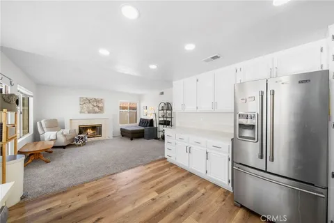 a bed room with furniture and a fireplace