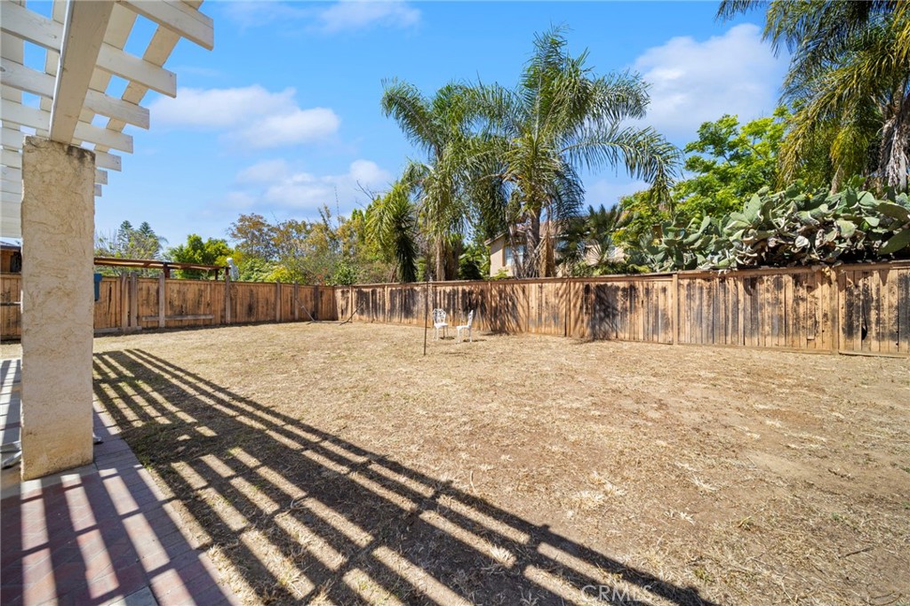 9253 Sunridge Drive Riverside, CA 92508 - Photo 48 of 57 a view of a backyard with a fountain