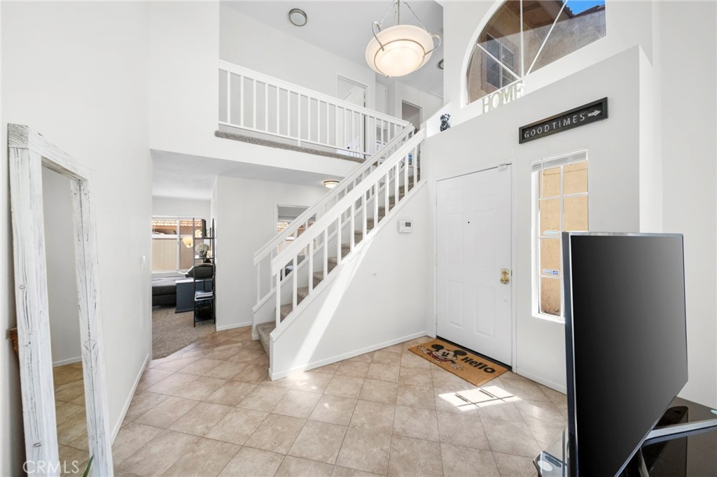 9253 Sunridge Drive Riverside, CA 92508 - Photo 7 of 57 a view of entryway and hall with wooden floor