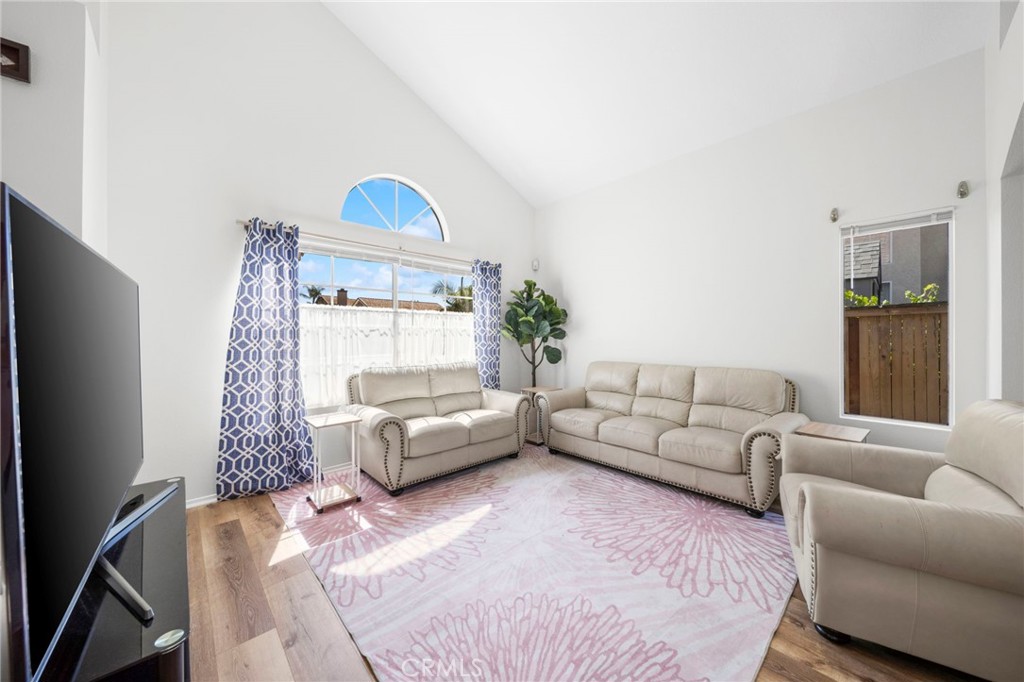 9253 Sunridge Drive Riverside, CA 92508 - Photo 9 of 57 a living room with furniture and a window