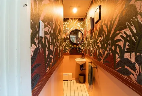 a bathroom with a shower and sink
