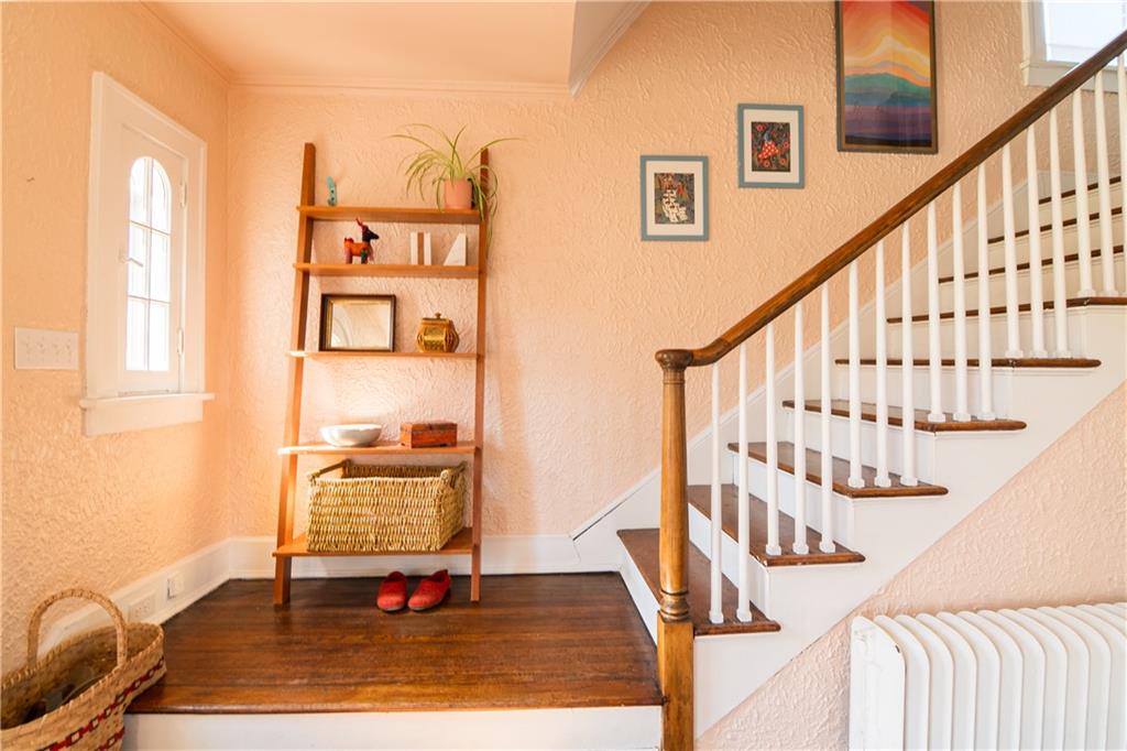 6673 Kinsman Road Pittsburgh, PA 15217 - Photo 18 of 50 a view of entryway and hall with wooden floor