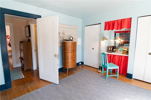 a room with furniture and a walk in closet