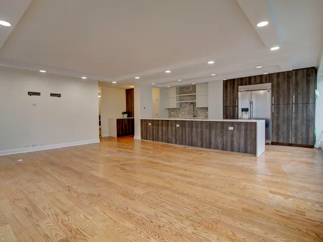 a view of kitchen and kitchen with furniture