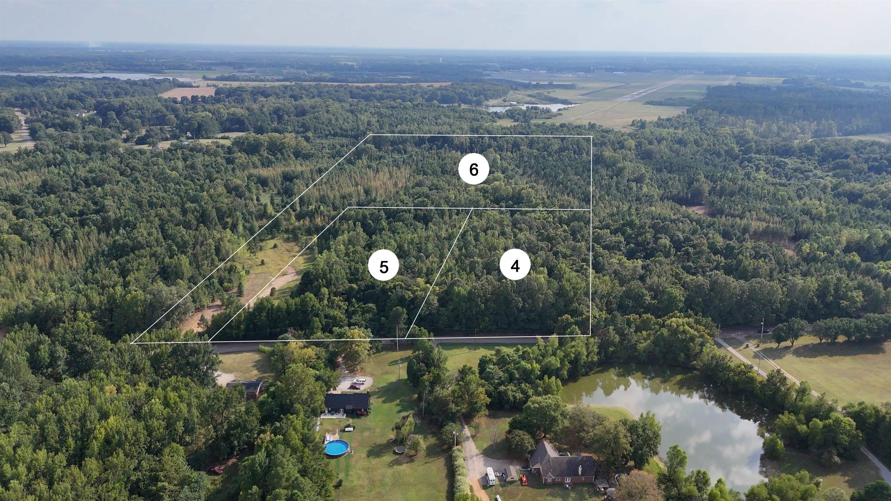 Bethuel Road Millington, TN 38053 - Photo 3 of 13 an aerial view of a house with a lake view