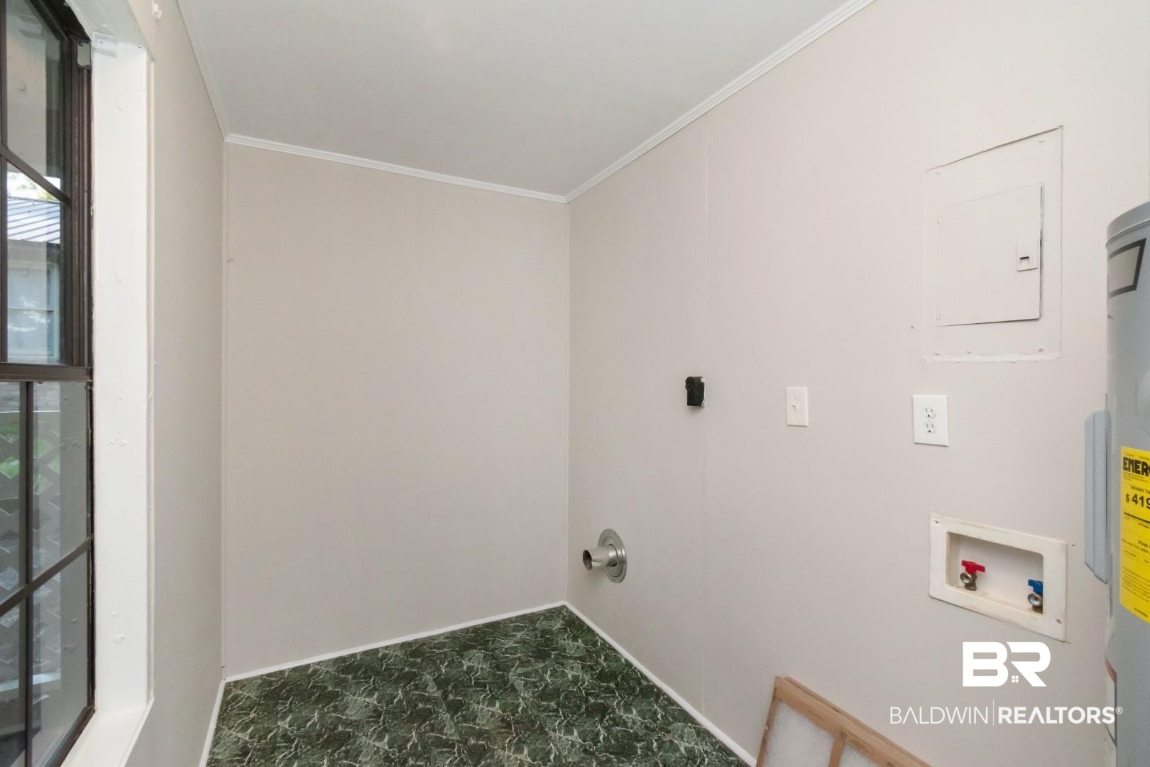 1220 Garland Drive Mobile, AL 36618 - Photo 14 of 25 Clothes washing area featuring hookup for an electric dryer, tile patterned flooring, crown molding, and hookup for a washing machine