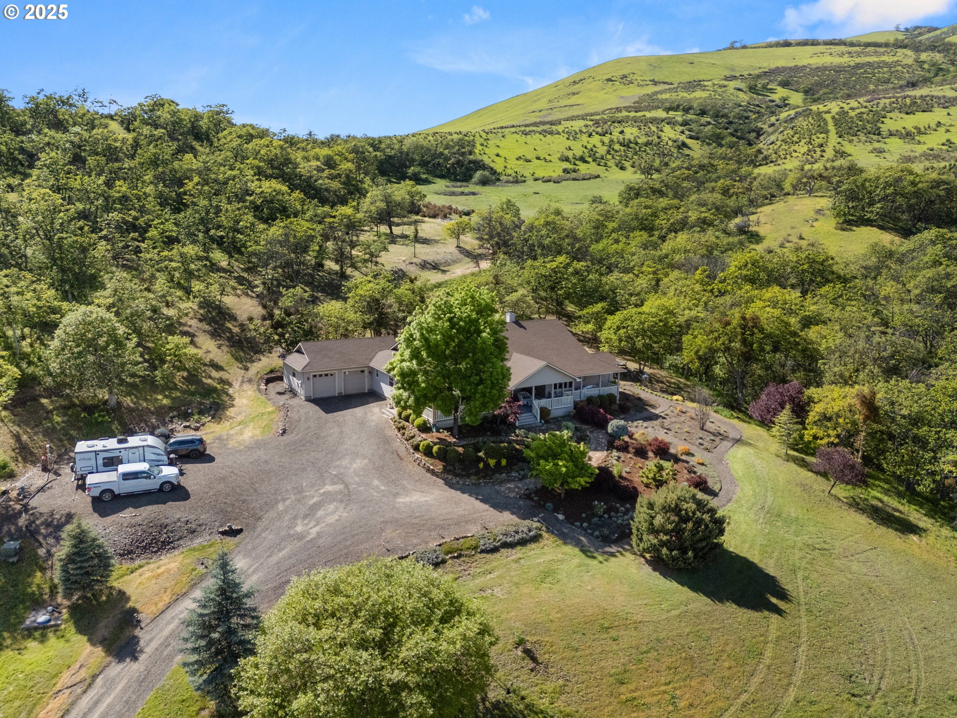 2809 Dead Indian Memorial Road Ashland, OR 97520 - Photo 2 of 45 a view of a garden with a houses